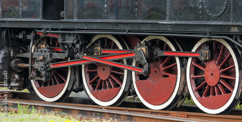 Old choo-choo train wheels detail