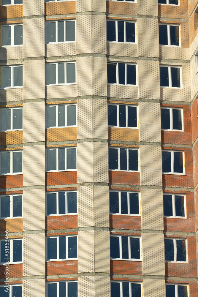 Front view of new construction building closeup vertical