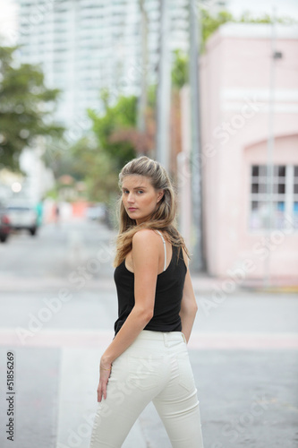 Stock image of a woman looking over her shoulder