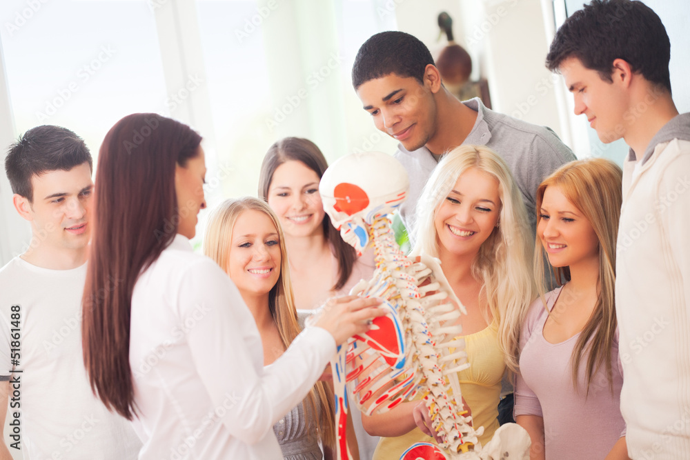 Portrait of a college student surrounded by his peers. Portrait of a college student surrounded by his peers.