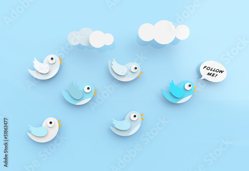 Cute twitter birds following each other. photo