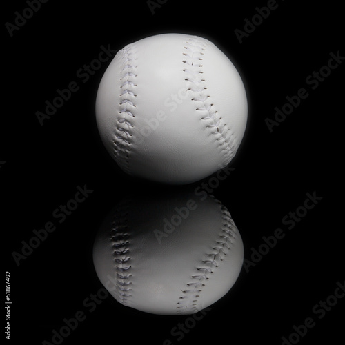 baseball ball over black background