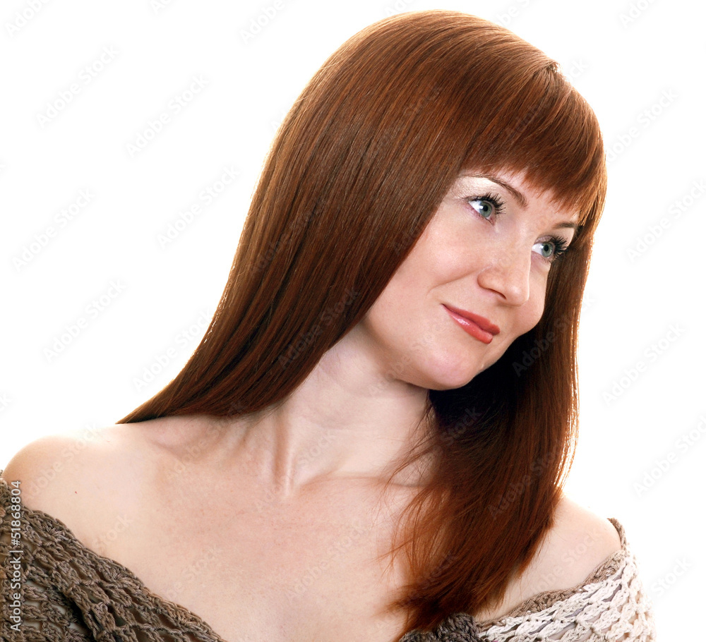 Naklejka premium beautiful young girl with red hair isolated