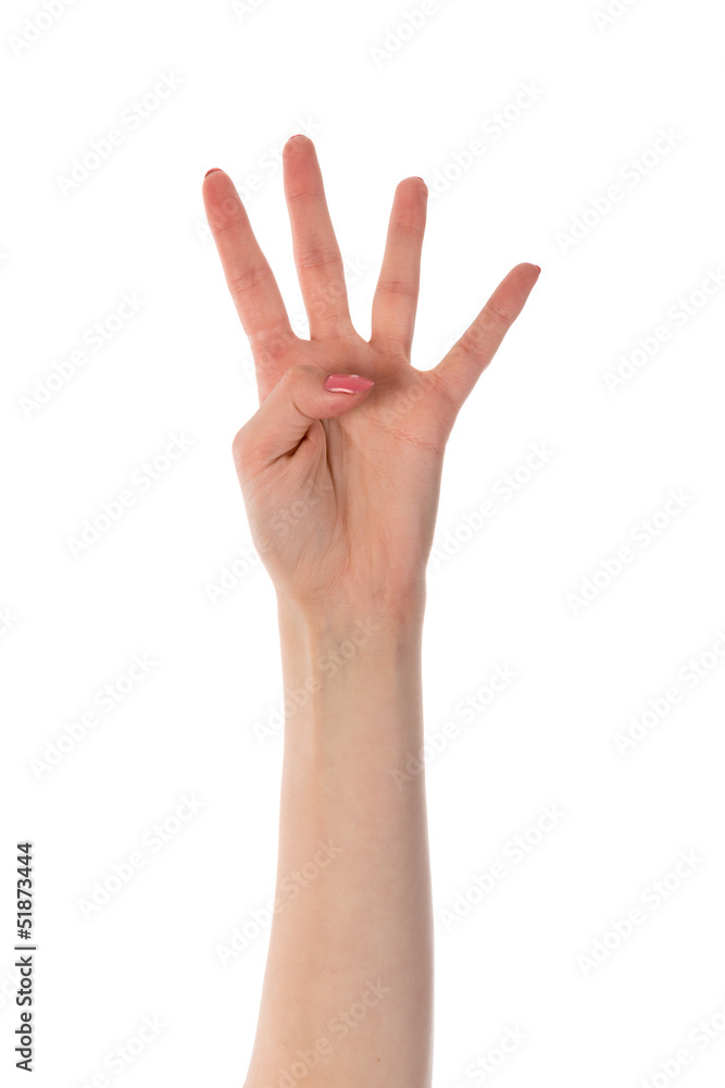 Female hand showing four fingers isolated on white background Female hand showing four fingers isolated on white background