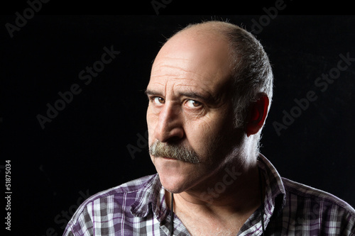 Annoyed Bald Man with Mustaches. Angry Expression