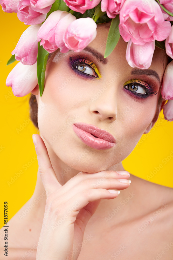 Beautiful woman with flower wreath.