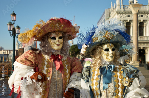 Venetian costume attends Carnival of Venice.