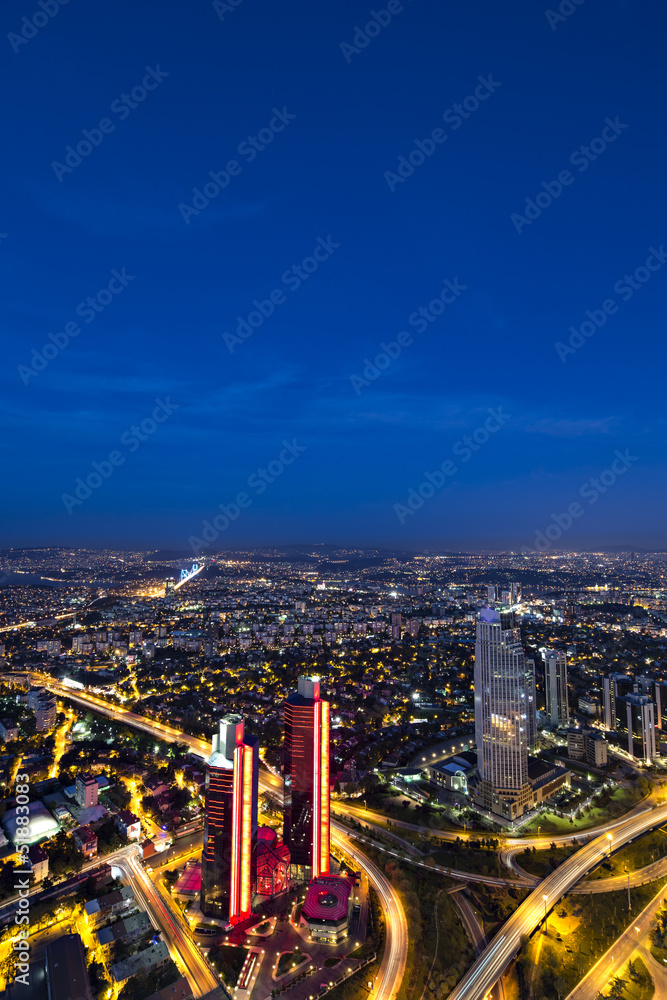 Skyscrapers, Bosphorus and bridge at night, Istanbul, Turkey