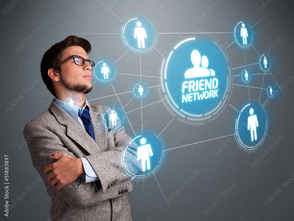 Handsome man looking at modern social network Handsome man looking at modern social network