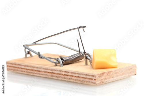 Mousetrap with piece of cheese isolated on white