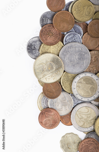 Coins of different countries on a white background