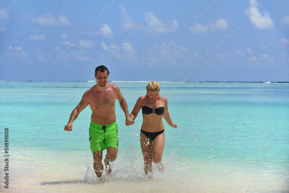 happy young  couple at summer vacation have fun and relax