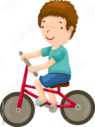 young boy riding a bicycle