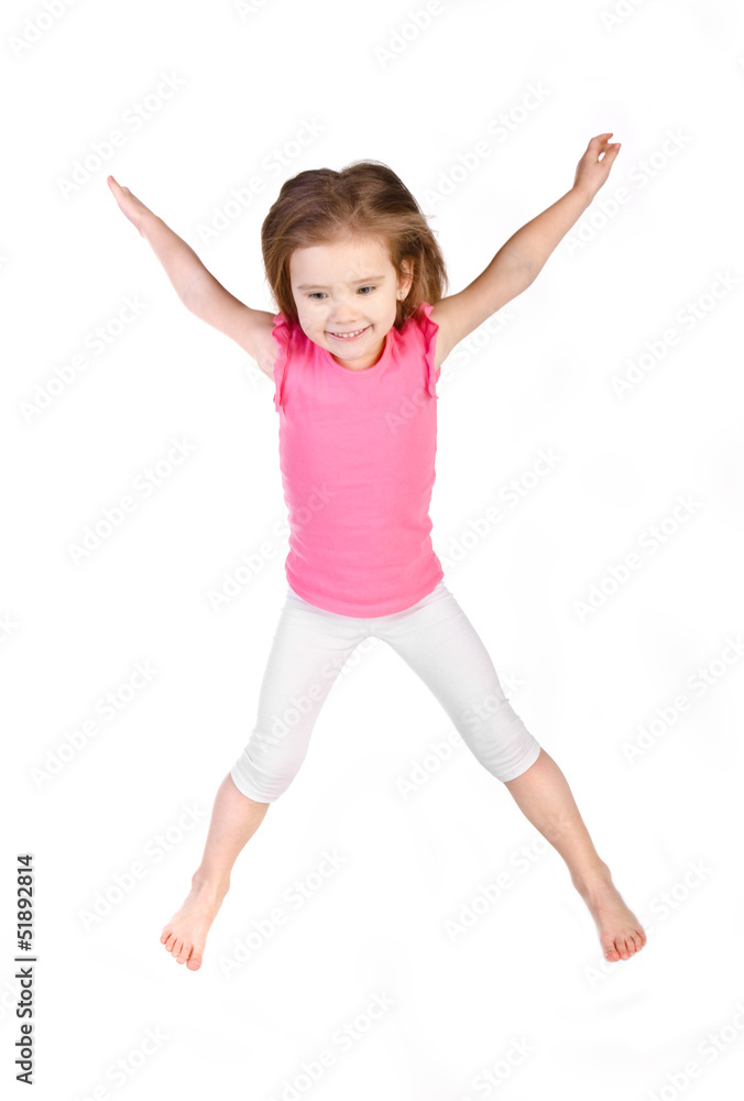 Adorable little girl jumping in air isolated Adorable little girl jumping in air isolated