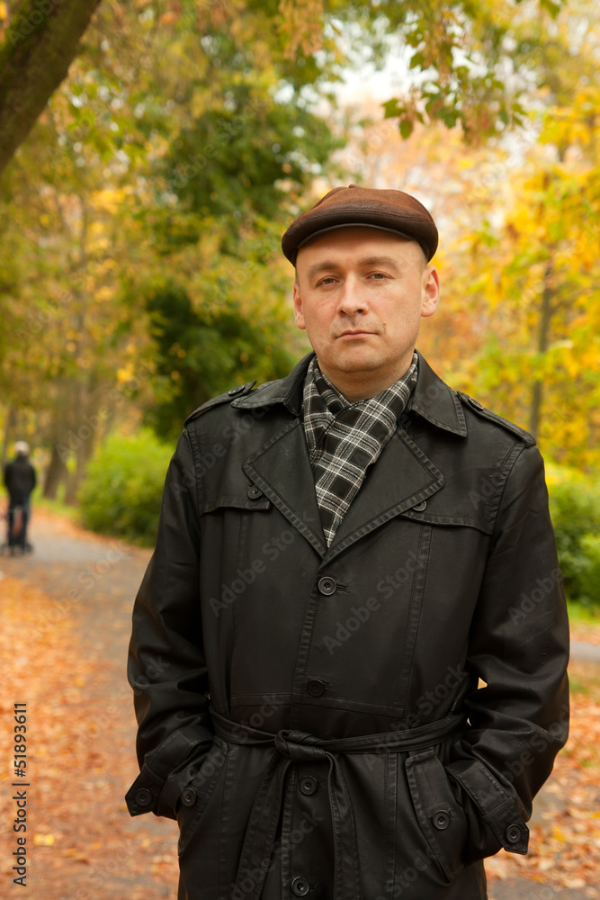 man walking in autumn man walking in autumn