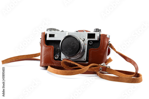 Old camera with case isolated on white background.