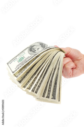 Hand holding a stack of money isolated on white background.