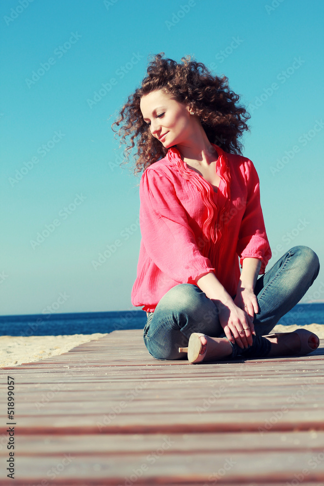 Fashion outdoor portrait of young girl in a summer style  