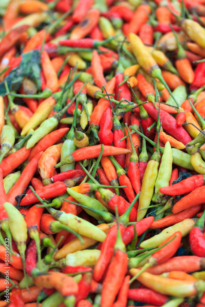 Chilli peppers on market stall Chilli peppers on market stall