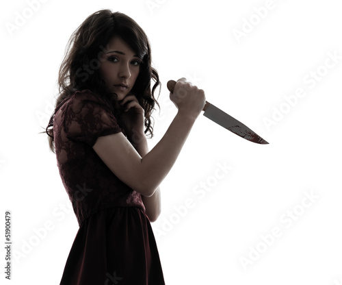 Foto strange young woman killer holding  bloody knife silhouette