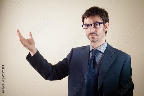success businessman pointing with pen