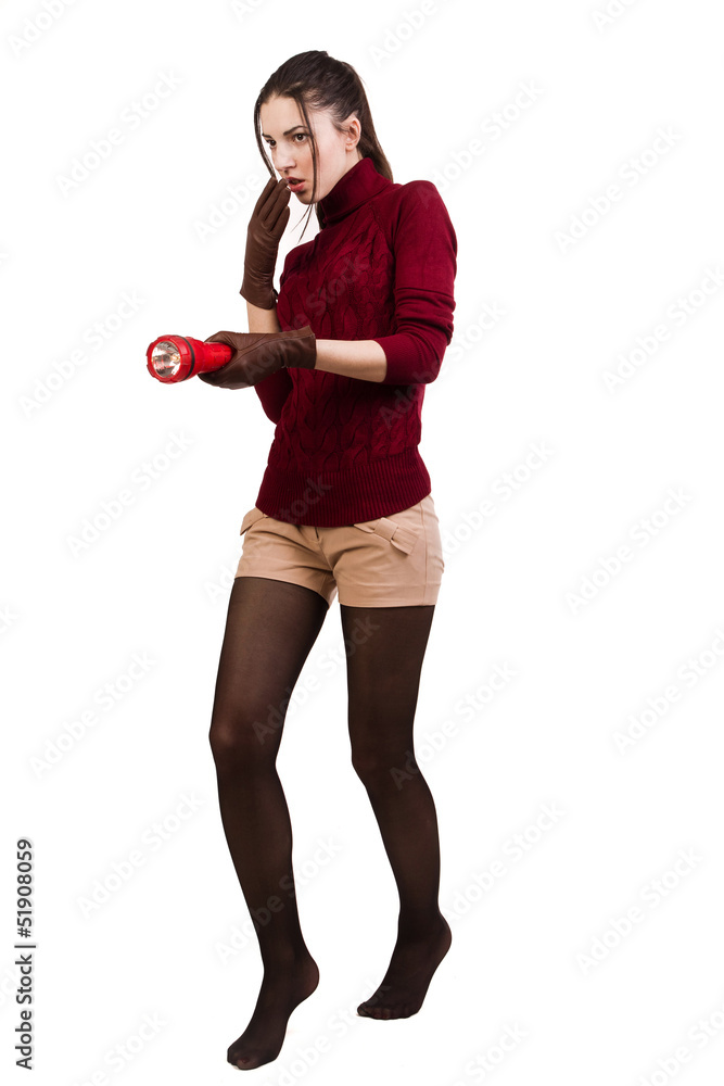Frightened brunette with a lantern over white Frightened brunette with a lantern over white