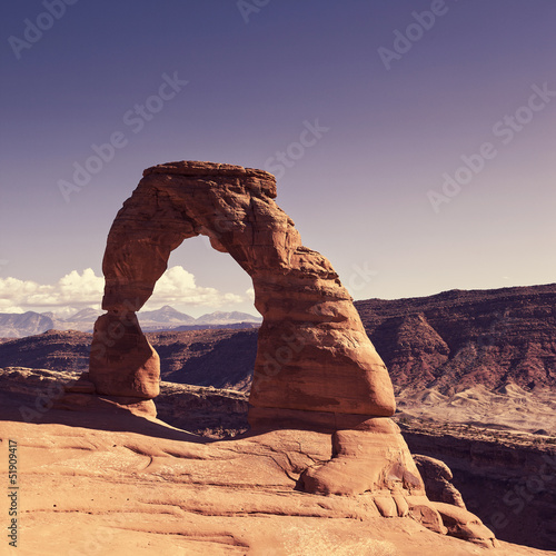 View of the famous Delicate Arch at sunset