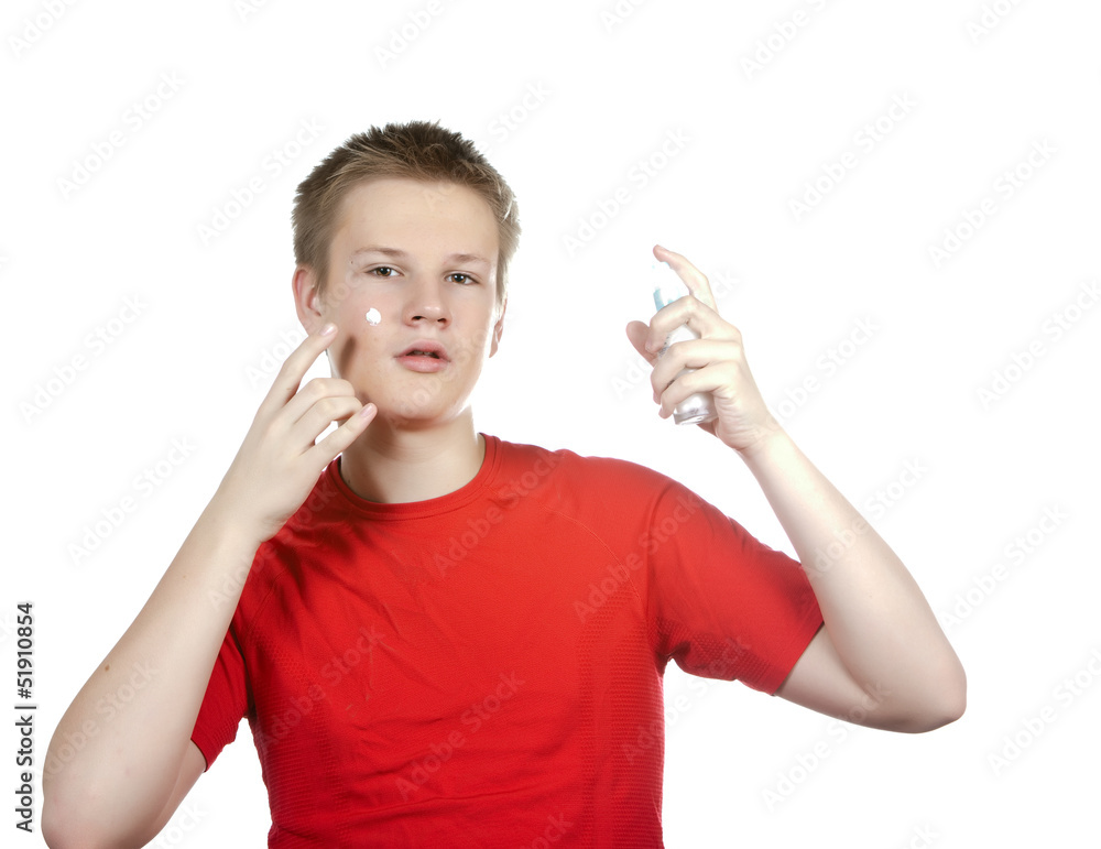 teenager with a cream forproblem youthful skin,against spots... teenager with a cream forproblem youthful skin,against spots...