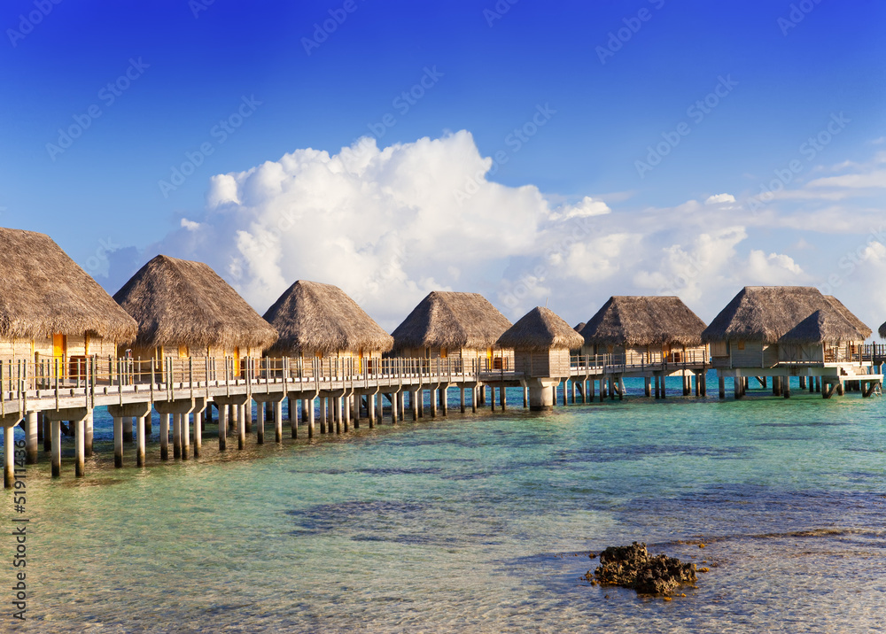 Typical Polynesian landscape -small houses on water.
