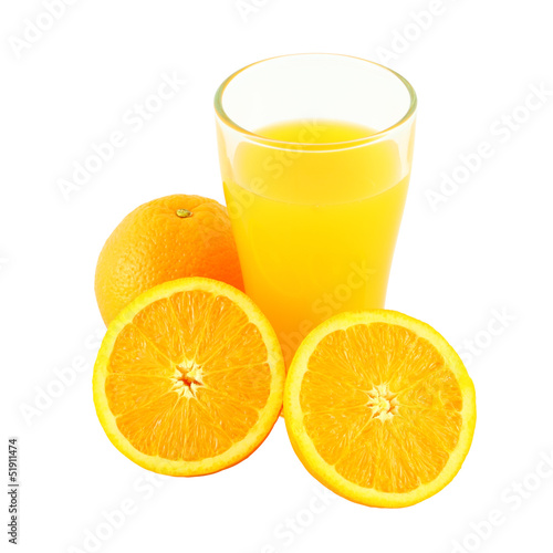 Glass of orange juice and two riped fruit side
