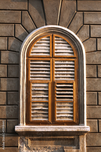 vintage window with closed shutters