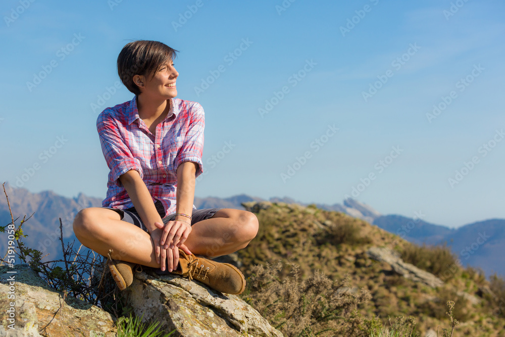 Young Woman at Top of Mountain