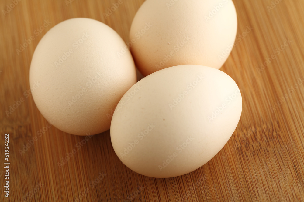 eggs on wooden background eggs on wooden background