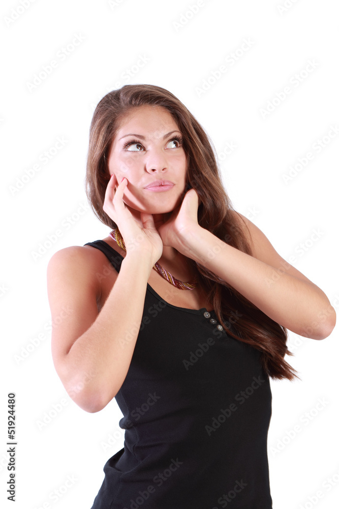 Вreaming girl looks up and touches chin isolated on white Вreaming girl looks up and touches chin isolated on white