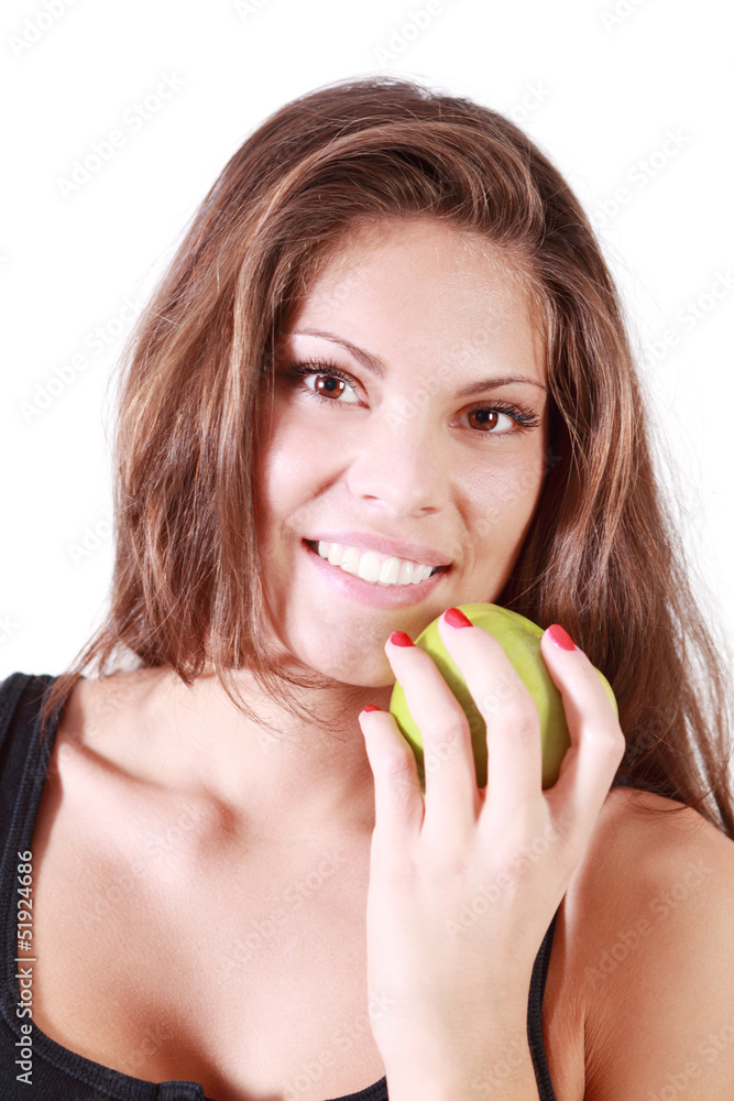 Beautiful smiling girl holds green apple isolated on white Beautiful smiling girl holds green apple isolated on white