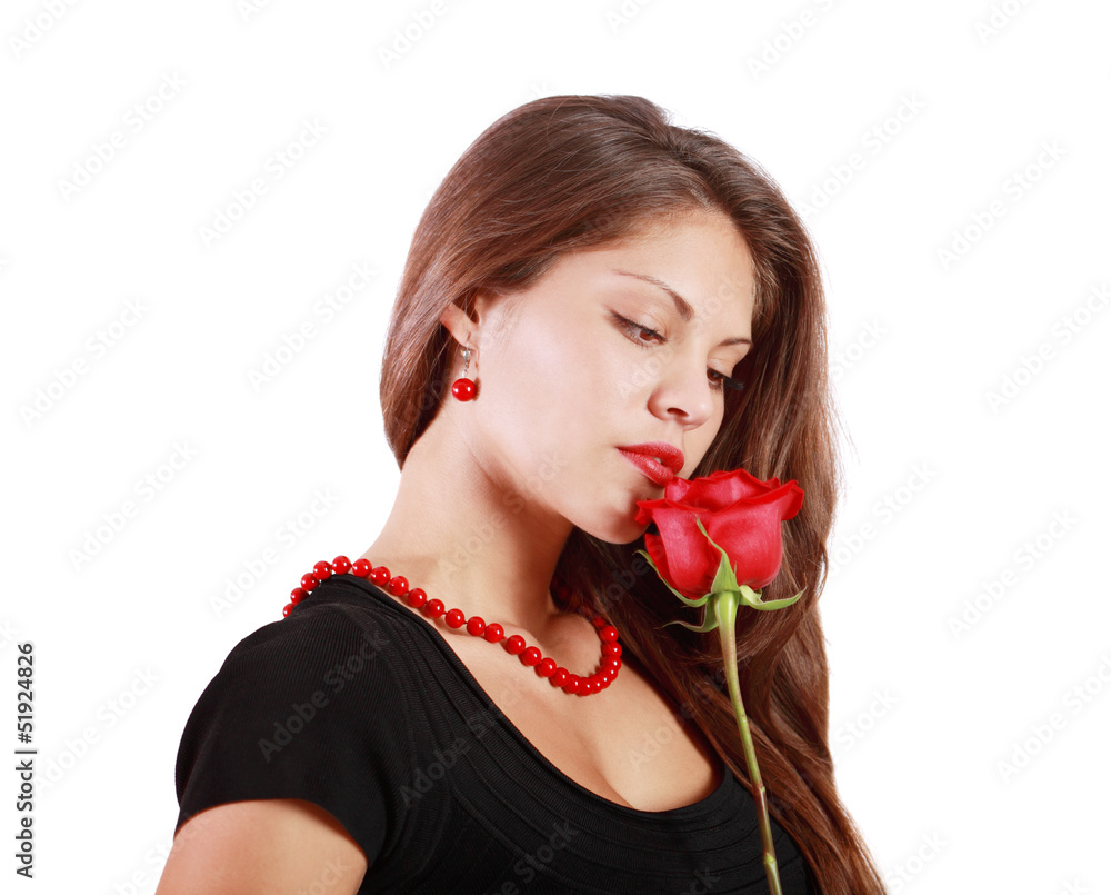 Pensive beautiful woman looks at red rose isolated on white Pensive beautiful woman looks at red rose isolated on white