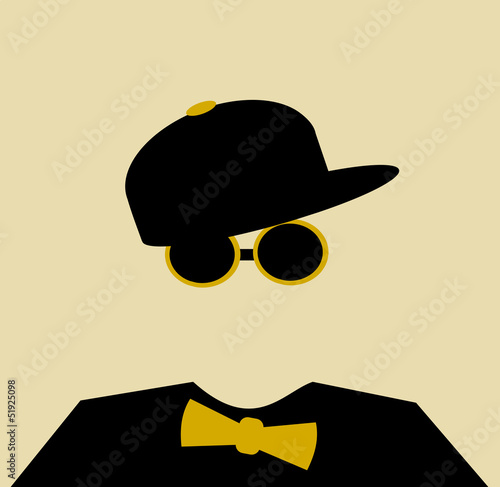 man wearing baseball cap and bow tie