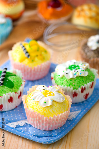cup cakes with a lot of bread pastry background