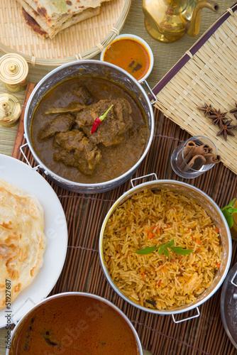 Biryani mutton rice with traditional background photo