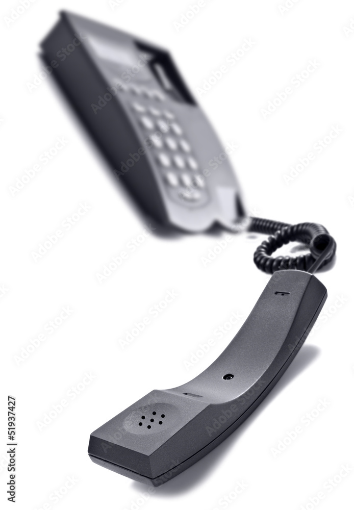 Black telephone on white with space for text Black telephone on white with space for text