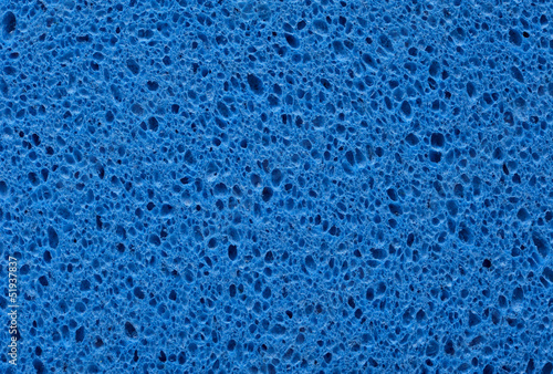 blue sponge with porous texture background photo