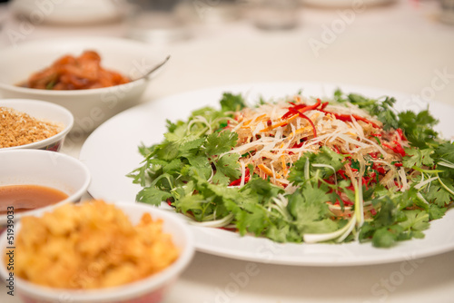 Raw fish salad (also known as Yu Sheng or Lo Hei), a Chinese New