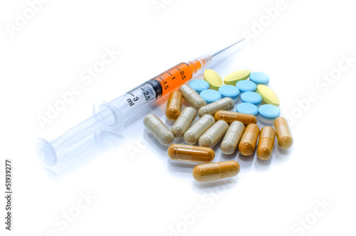 Syringe and Pills