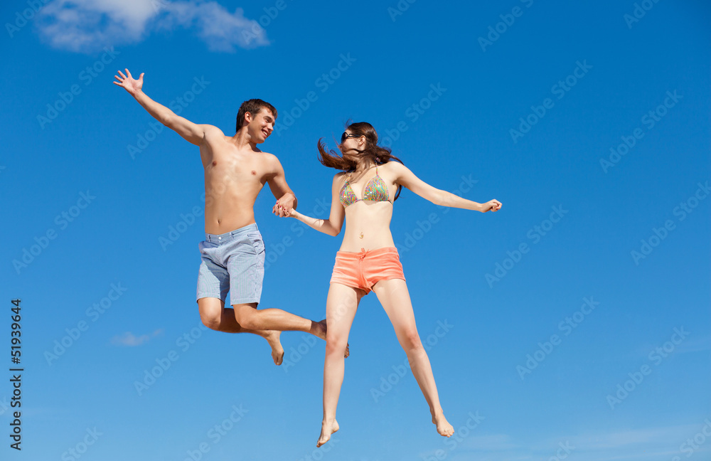 Happy Young Couple Together On The Beach Happy Young Couple Together On The Beach