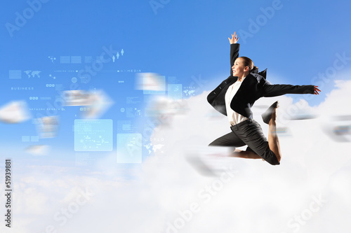 businesswoman in black suit jumping