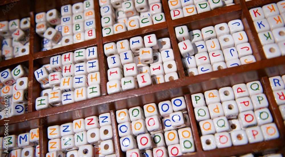 Wooden Tray of Ceramic Beads of the Alphabet