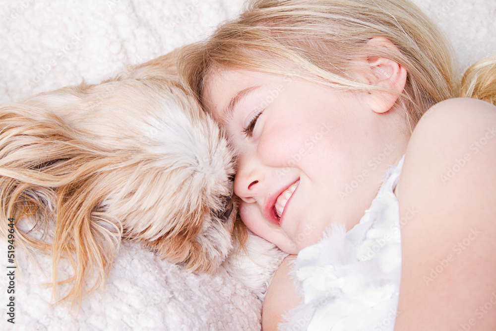 girl laying with shih tzu dog girl laying with shih tzu dog