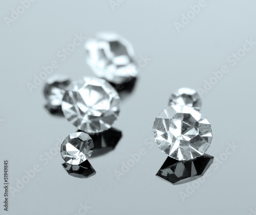 Beautiful shining crystals  diamonds   on grey background