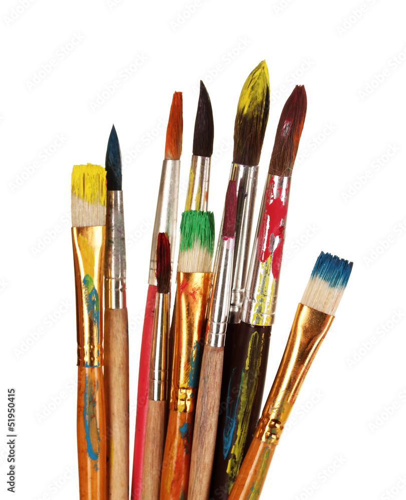 Obraz premium Many brush in paint closeup isolated on white