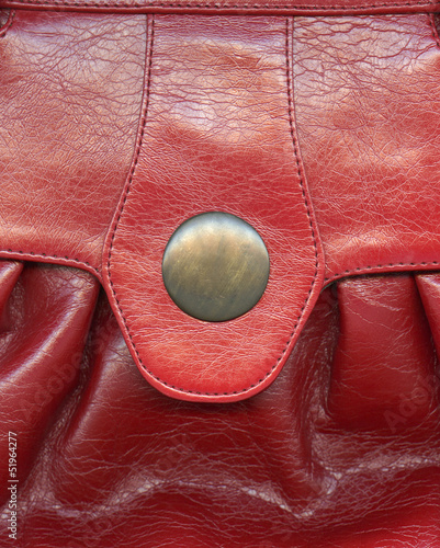  fragment of red handbag ,stitches